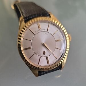 Longines Mystery Mecanical( Movement Only LONGINES) with Black Strap Watch.